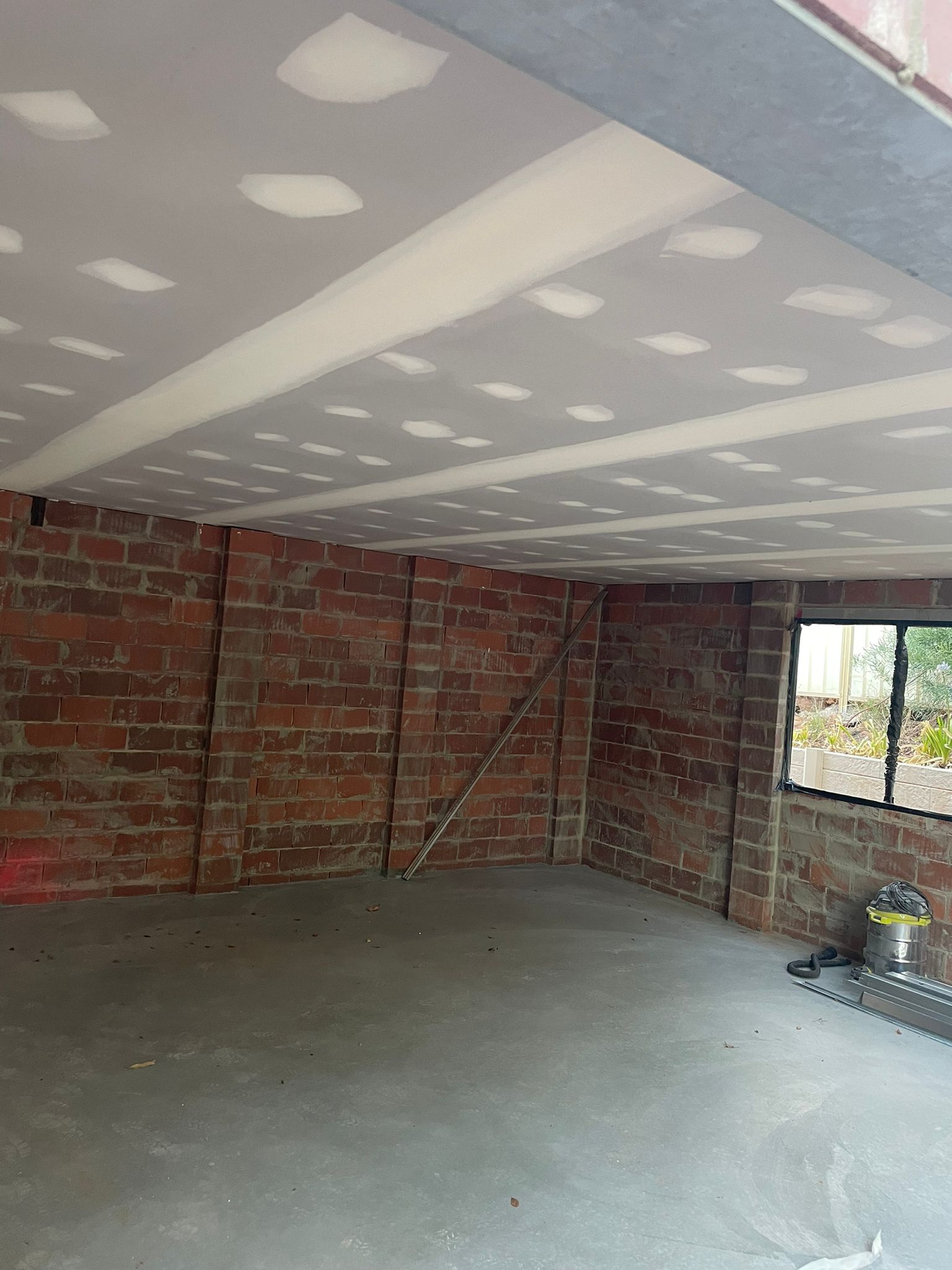 Signature Ceilings team working on a Perth ceiling project