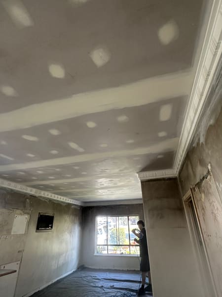 Fire damage ceiling repair with decorative plasterglass cornices in Fremantle